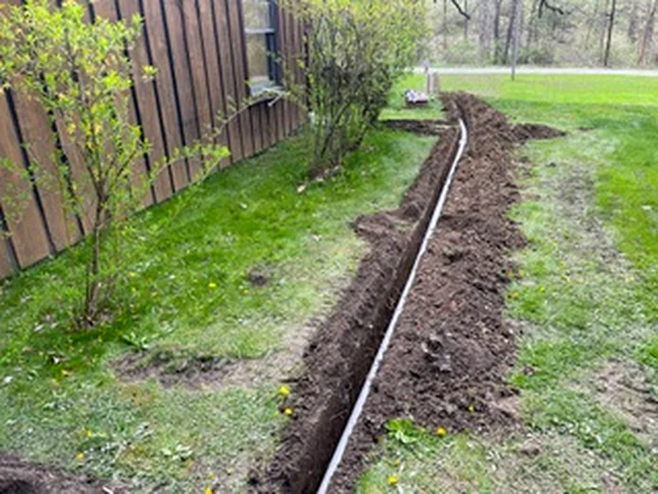 Pump & Gutter Discharge Lines project photo by Sferra Waterproofing