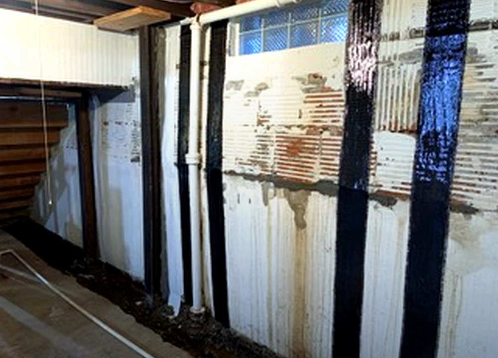Carbon fiber reinforcement on basement block wall by Sferra Waterproofing