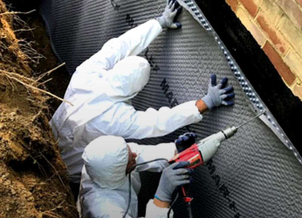 Exterior drainage mat installation by Sferra Waterproofing