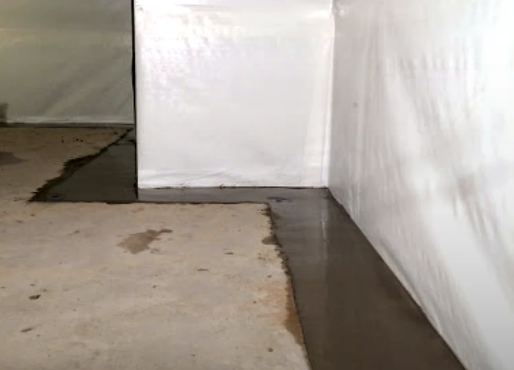 Interior drainage and vapor barrier work by Sferra Waterproofing
